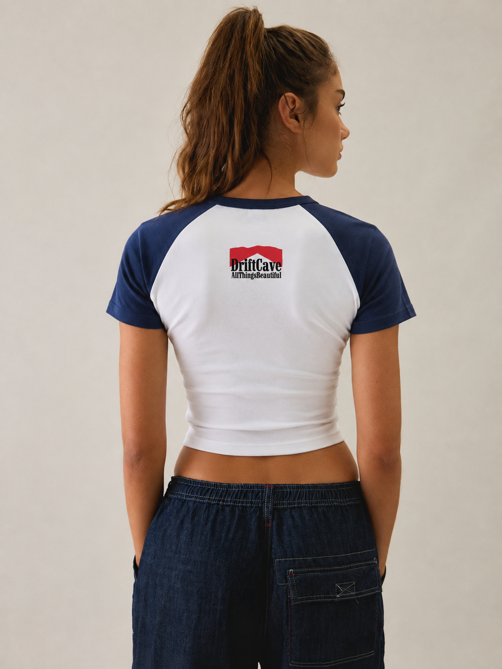 Two-tone navy/white baby tee back with DriftCave logo and short sleeves