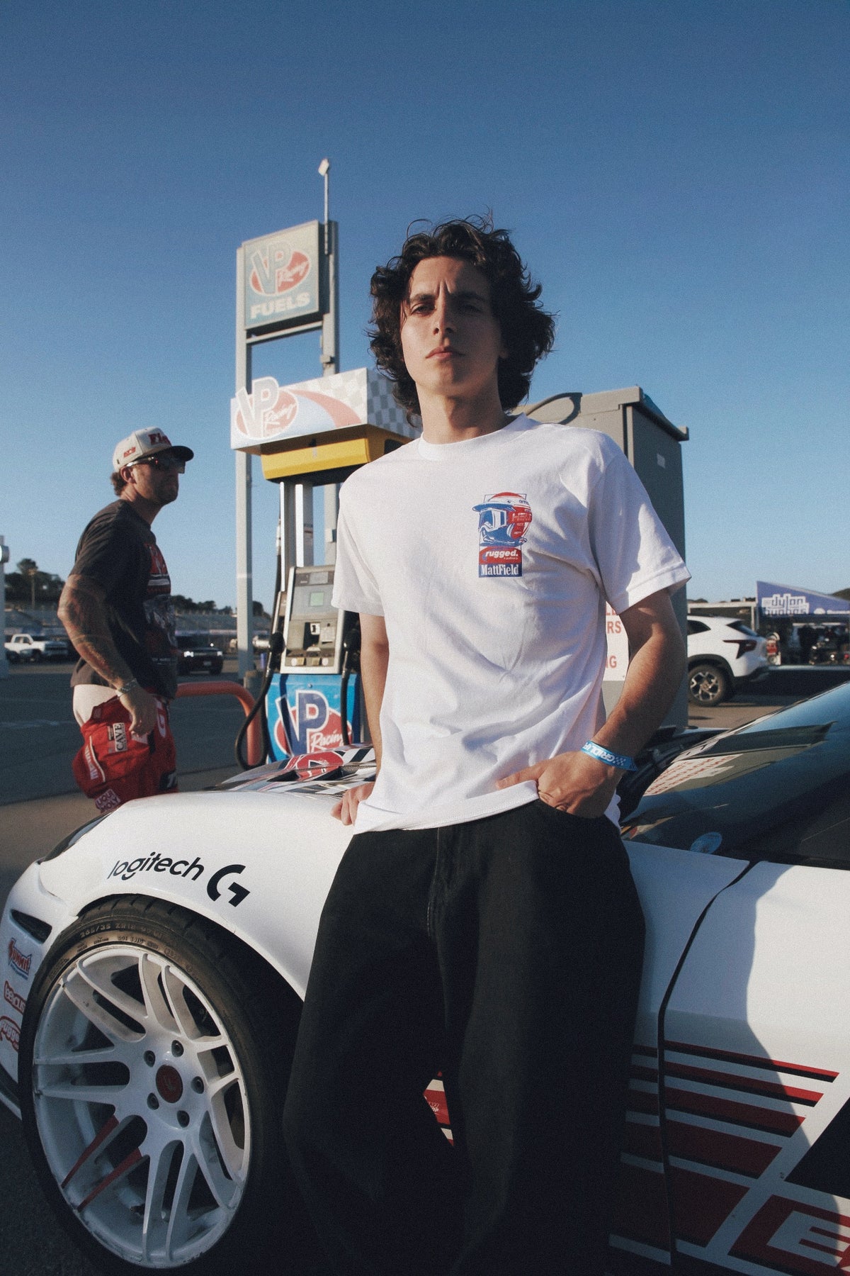 White MF x Rugged Radios T-shirt with small front chest logo