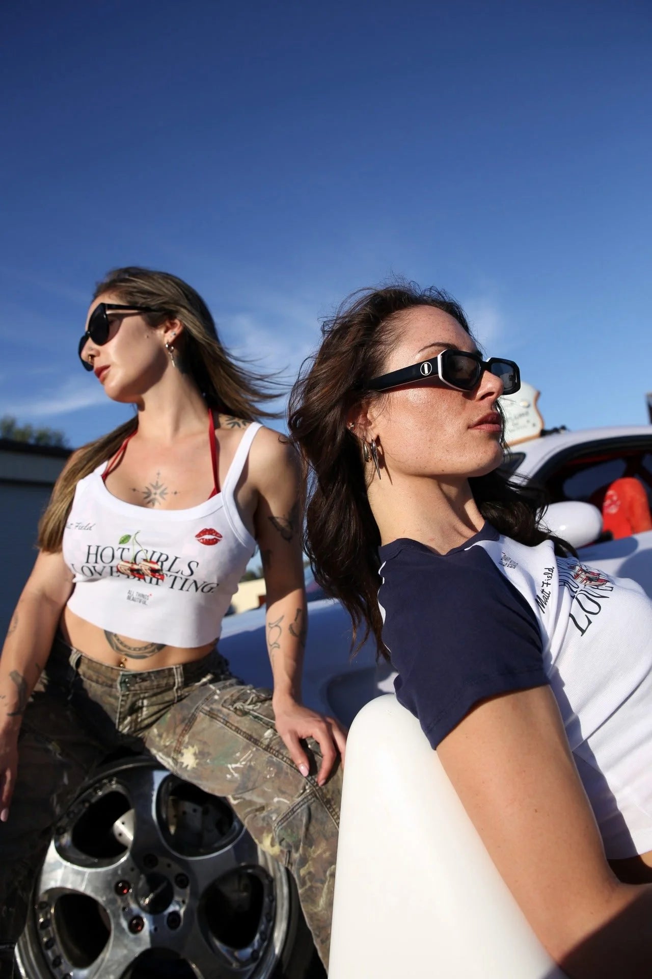 White cropped tank top with Hot Girls Love Drifting text graphic