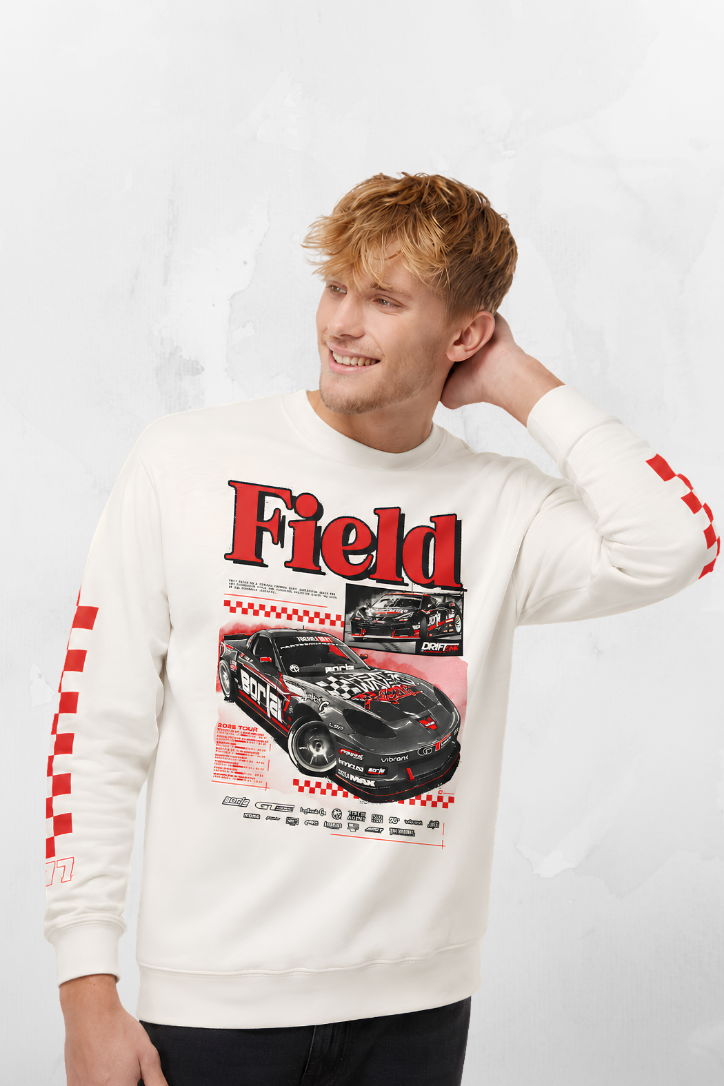 Ivory crewneck sweatshirt with red 'Field' racing car graphic, model wearing it