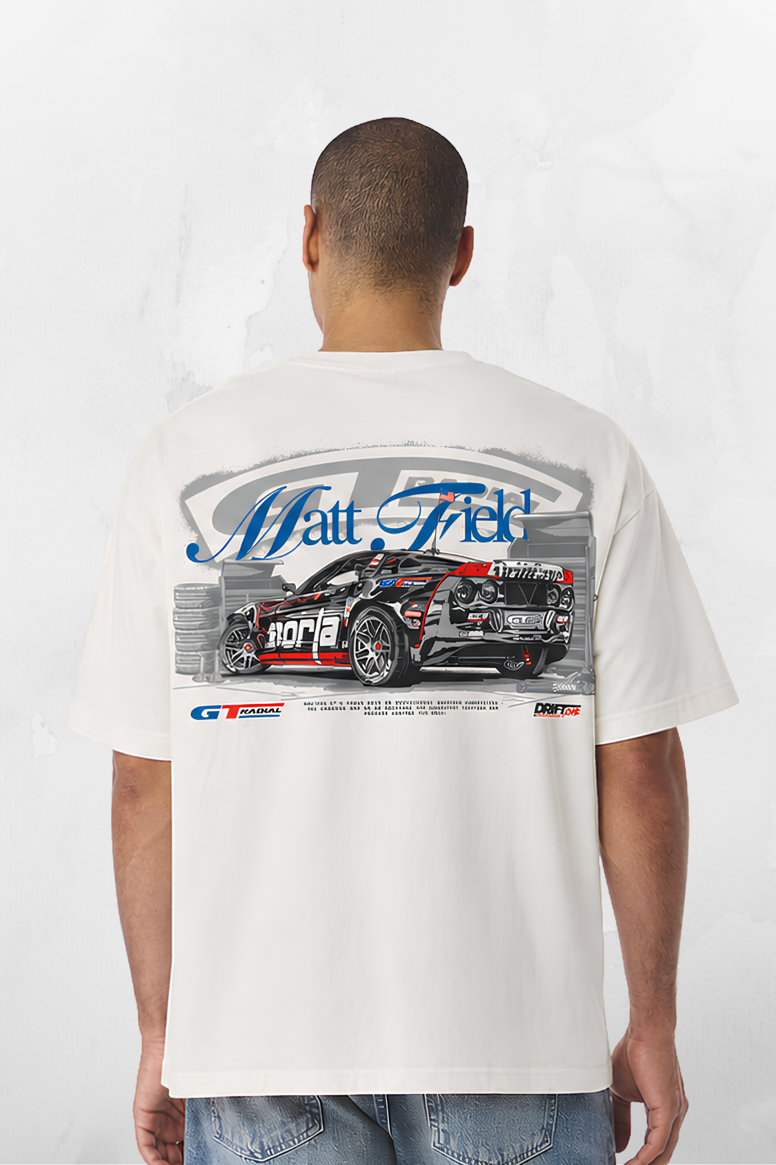 White T-shirt with large back graphic of race car and Matt Field-style logo